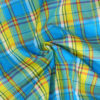 Véritable tissu madras coton turquoise, jaune et rouge